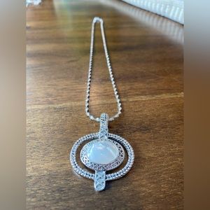 18” silver tone necklace with pearly white stone
